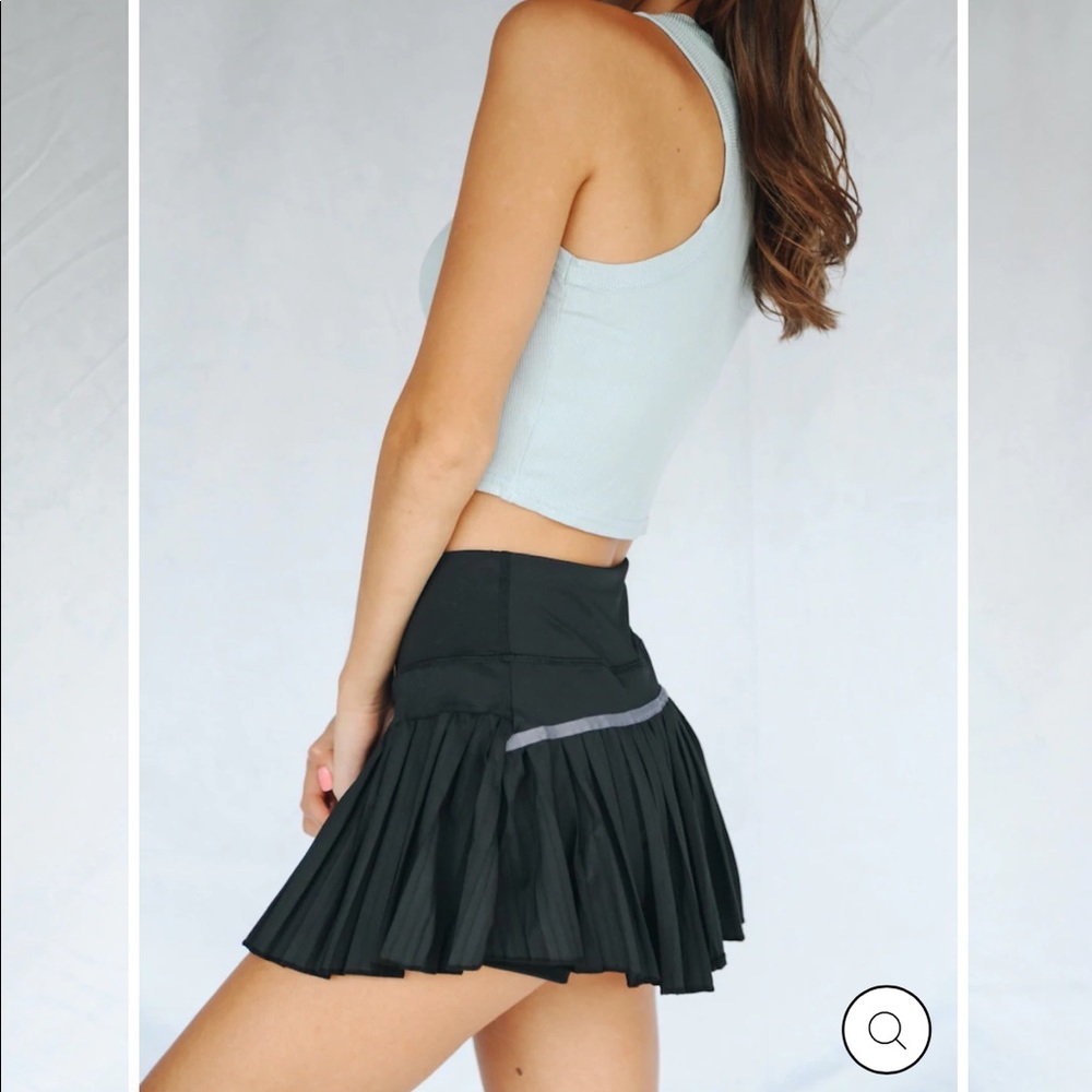 Gold hinge black pleated tennis skirt size small. Brand new with tags!!